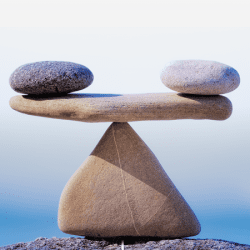 Two stones balanced on a stone platform